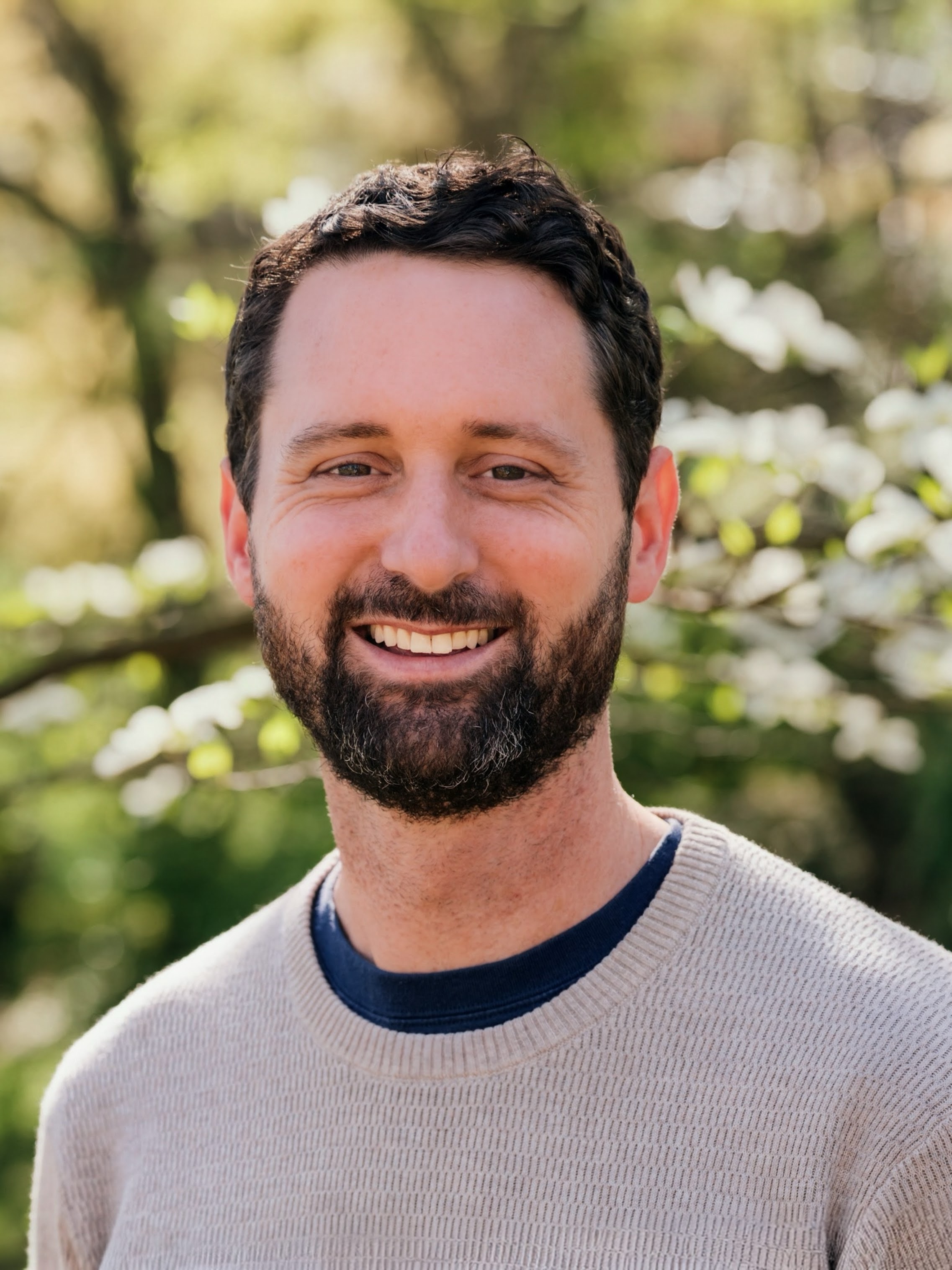 Headshot of Adam J. Dugan